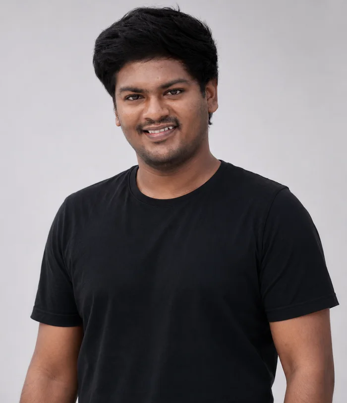 Arun, smiling at the camera